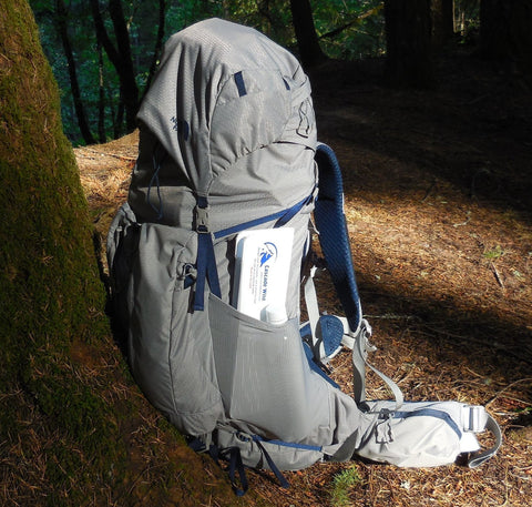 A backpack in the woods
Description automatically generated